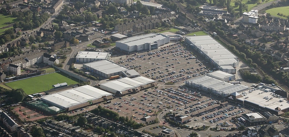 ... y vende una cartera comercial en Reino Unido a Orion por 477 millones de euros