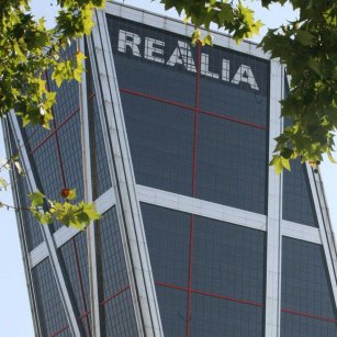 Realia aprueba la absorción del negocio inmobiliario de FCC