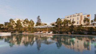 Aedas cae un 7% en bolsa y Neinor sube el 2% tras la oferta de compra